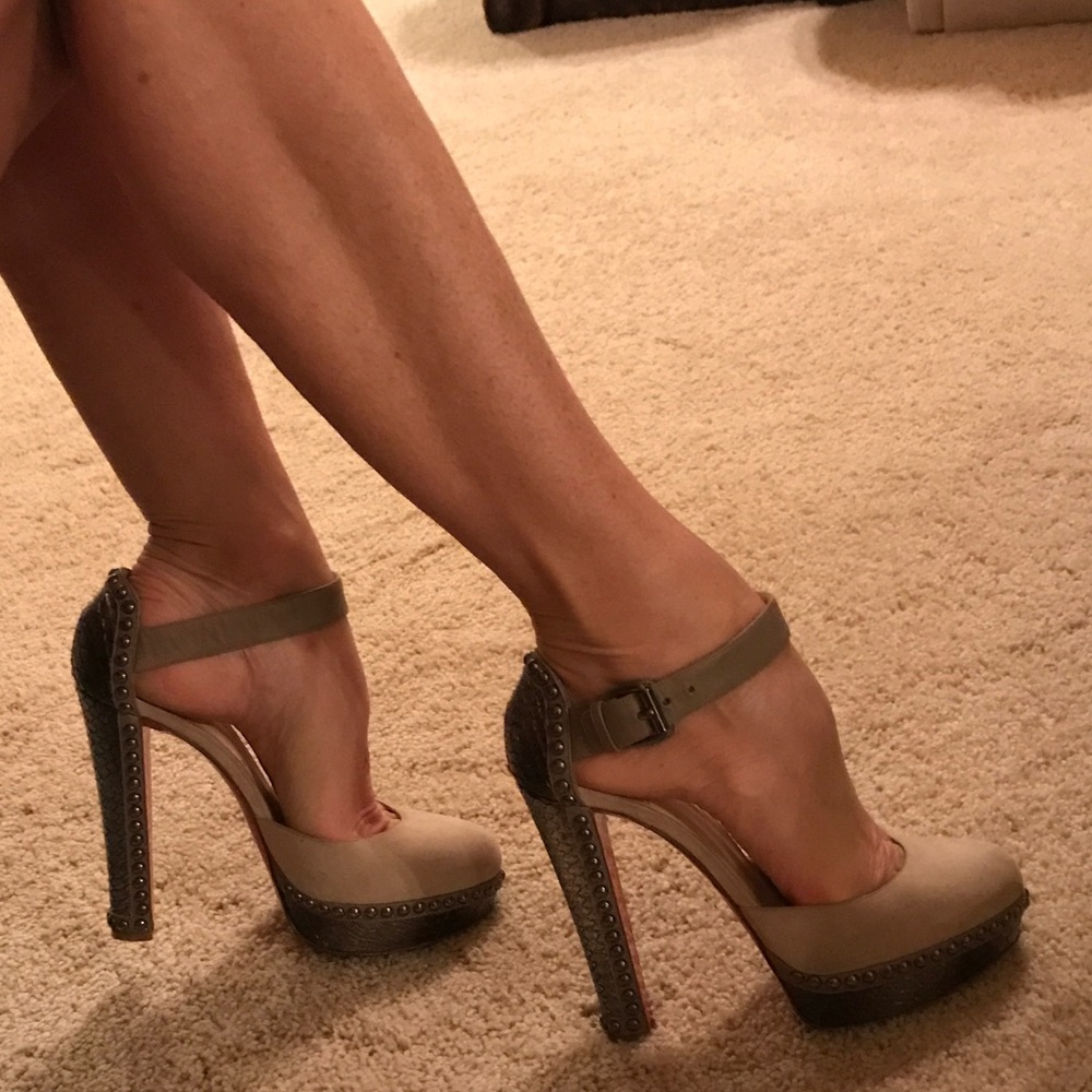 ISO. Im search of! Lost in fire.Christian Louboutin Snake Studs Platform Shoes.